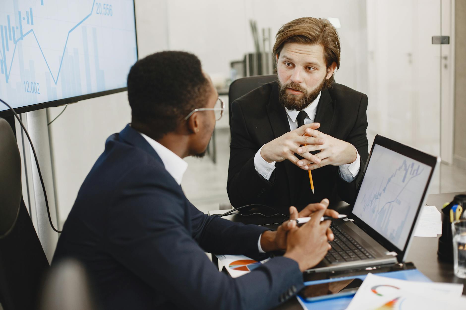 Business team having a data analytics conversation in plain English