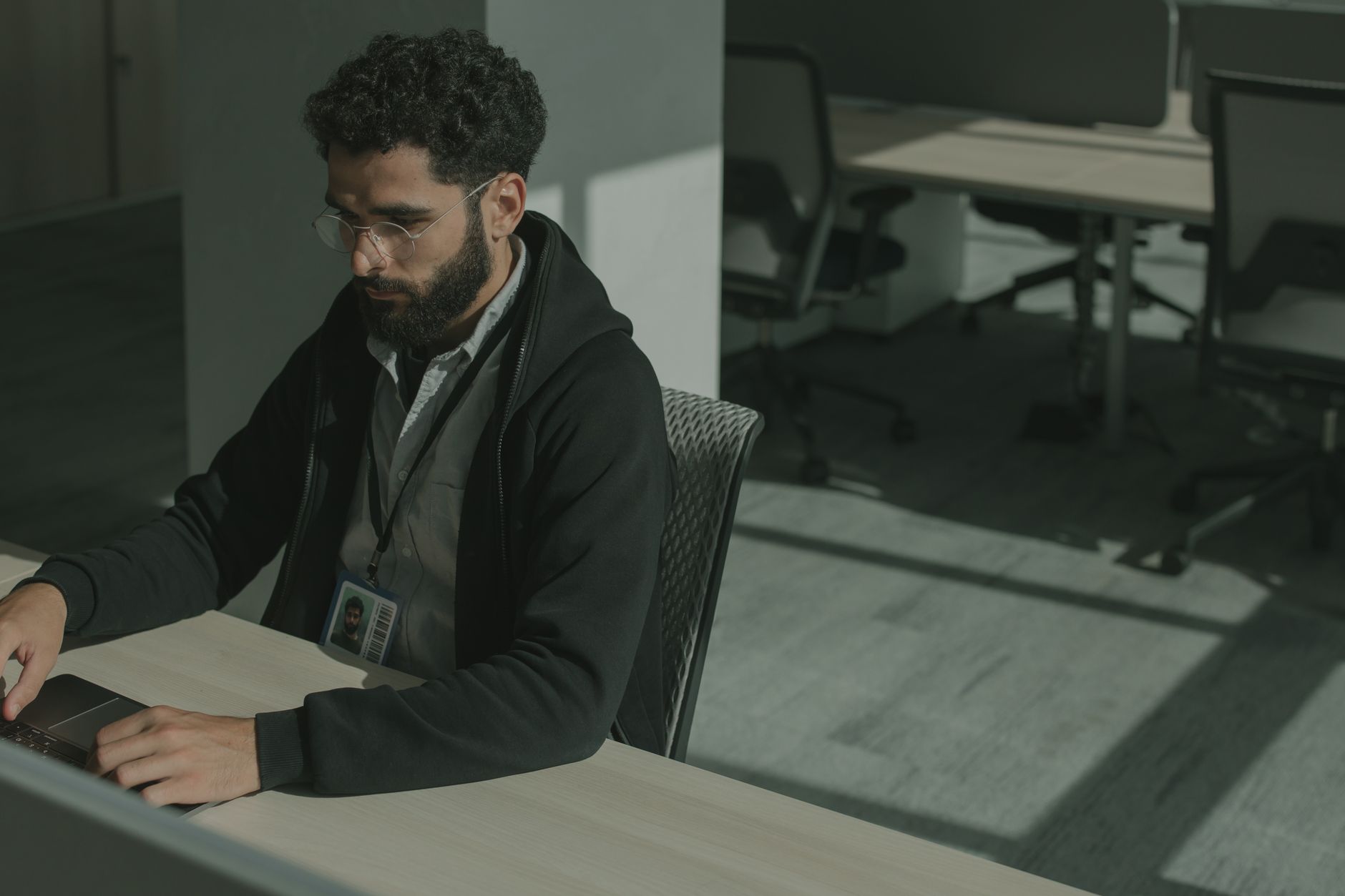 Office worker using a computer, illustrating Meta employee tracking and workplace privacy concerns