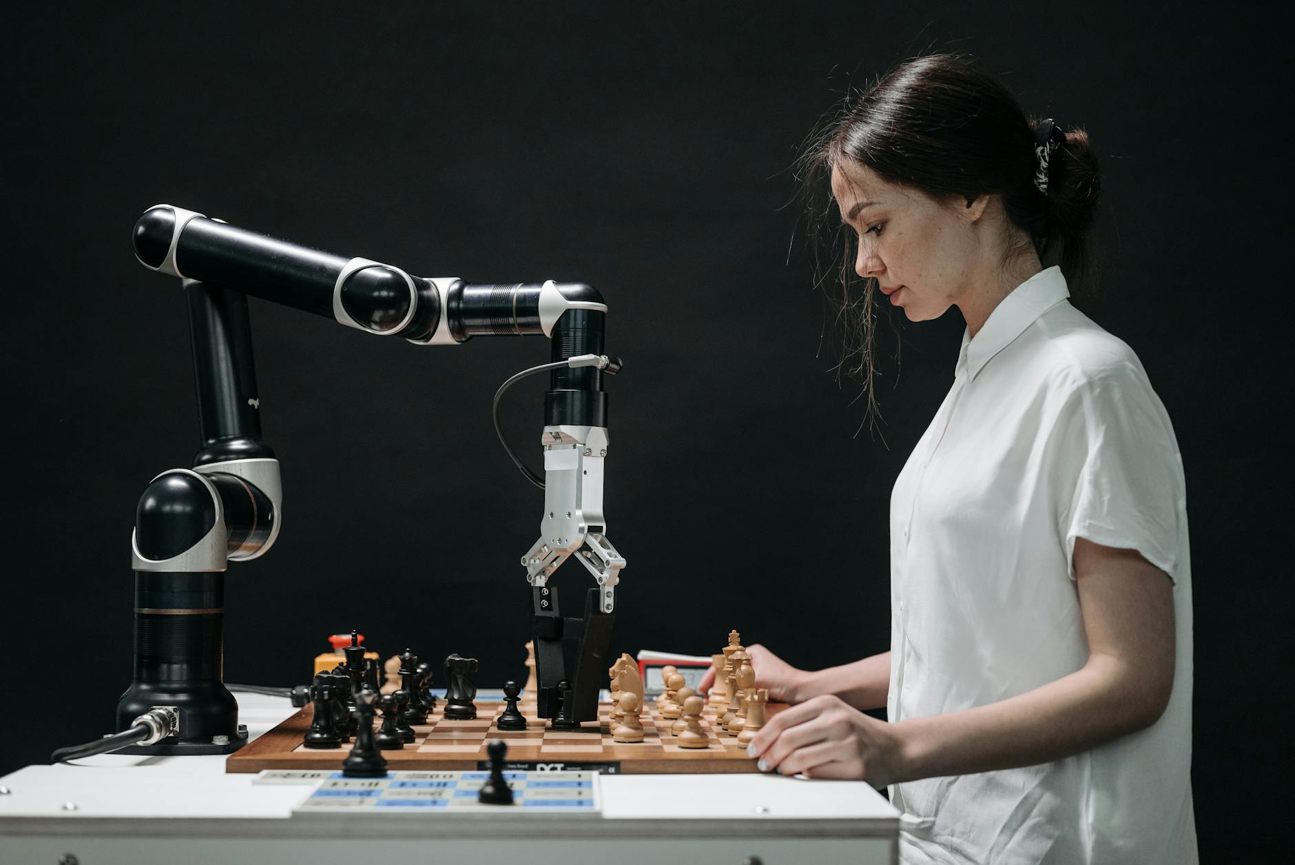 AI agents vs automation illustrated by human and robot strategic workflow planning